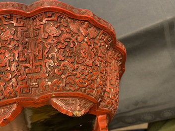 A Chinese carved cinnabar lacquer jardini&egrave;re, Yongzheng/Qianlong