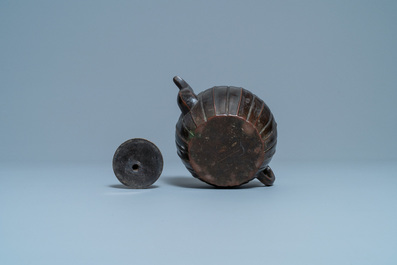 A Chinese lacquered bronze teapot and cover, Yuan