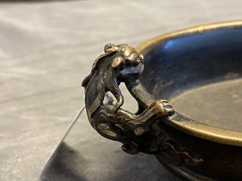 A Chinese chilong-handled bronze censer, Xuande mark, Ming