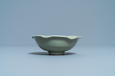 A Chinese Longquan celadon 'turtle in lotus flower' bowl, Song/Yuan