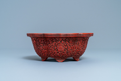 A Chinese carved cinnabar lacquer jardini&egrave;re, Yongzheng/Qianlong