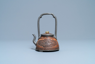 A rare Chinese jade-topped pewter-mounted coconut wine ewer, Kangxi