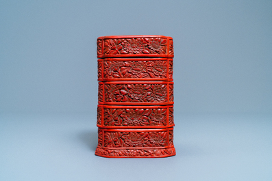 A Chinese red cinnabar lacquer four-tiered box, Wanli