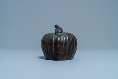 A Chinese lacquered bronze teapot and cover, Yuan