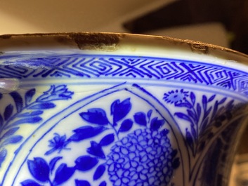 A pair of large Chinese blue and white 'Long Eliza' beaker vases, Kangxi