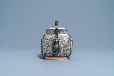 A large Chinese silver teapot and cover, 19th C.
