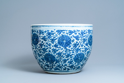 An exceptionally large Chinese blue and white 'lotus scroll' fish bowl, Kangxi