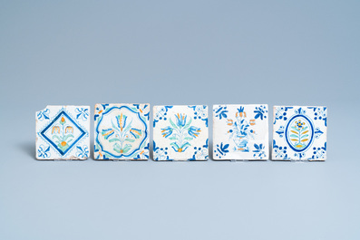 Ten polychrome Dutch Delft tiles with flowers and ornaments, 17th C.