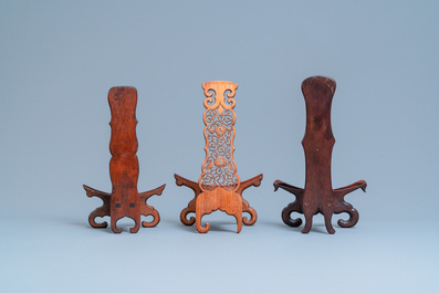 Eight Chinese carved wooden stands for dishes, 19/20th C.