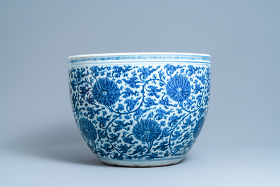 An exceptionally large Chinese blue and white 'lotus scroll' fish bowl, Kangxi