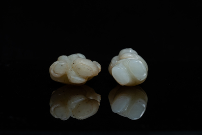 Two Chinese celadon jade figures of boys, 19/20th C.