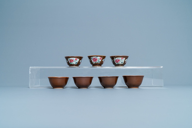 Sixteen Chinese famille rose capucin-ground cups and saucers, Qianlong