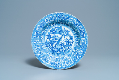 A pair of Chinese blue and white 'pheasant' chargers, Kangxi