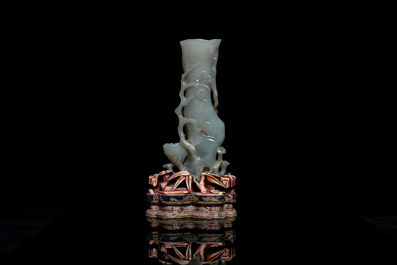 A Chinese jade vase on reticulated stand, Qing