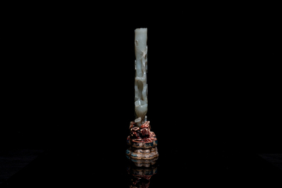 A Chinese jade vase on reticulated stand, Qing