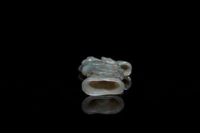 A Chinese jade vase on reticulated stand, Qing