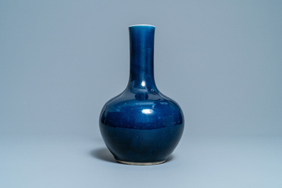 A Chinese monochrome 'sacrificial blue'-glazed bottle vase, Qianlong mark and of the period