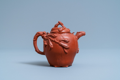 A Chinese Yixing stoneware lotus-shaped teapot and cover, Kangxi