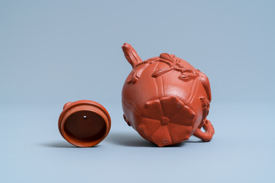 A Chinese Yixing stoneware lotus-shaped teapot and cover, Kangxi