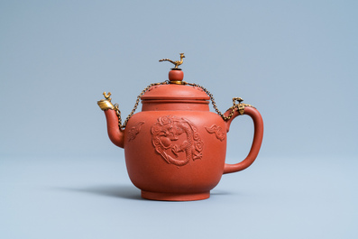 A Chinese gilt-mounted Yixing stoneware teapot and cover, Kangxi