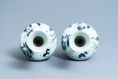 A Dutch Delft blue and white chinoiserie garniture of three vases, 17/18th C.