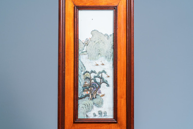 A Chinese carved wooden panel with landscape plaques, 19/20th C.