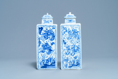 A pair of Chinese blue and white square vases and covers, Kangxi