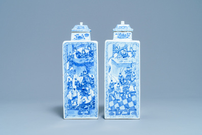 A pair of Chinese blue and white square vases and covers, Kangxi