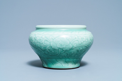 A Chinese celadon jar with floral design, Chenghua mark, Qianlong