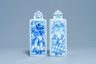 A pair of Chinese blue and white square vases and covers, Kangxi