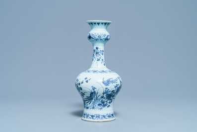 A Dutch Delft blue and white garlic head chinoiserie vase, late 17th C.