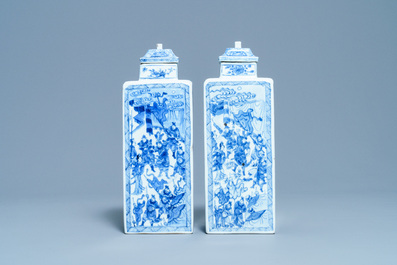 A pair of Chinese blue and white square vases and covers, Kangxi