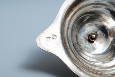 A Chinese blue and white silver-mounted ewer, Transitional period