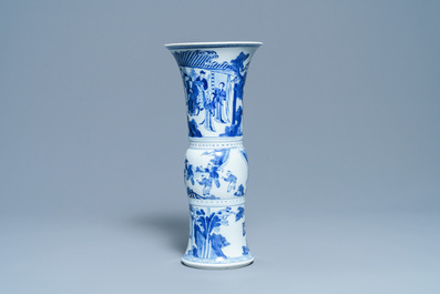 A Chinese blue and white 'gu' vase with figurative design, Kangxi