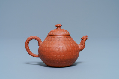 A Chinese Yixing stoneware dragon-spouted teapot and cover, Kangxi