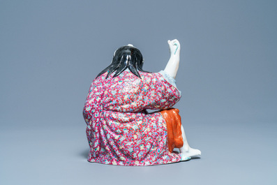 Une figure de Liu Hai en porcelaine de Chine famille rose, marque en creux, R&eacute;publique