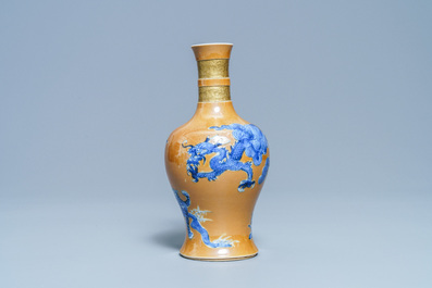 A Chinese caf&eacute;-au-lait-ground 'dragon and tiger' vase, Kangxi