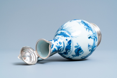 A Chinese blue and white silver-mounted ewer, Transitional period