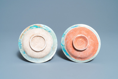 A pair of turquoise-glazed relief-decorated plates, Raqqa, Syria, 13/14th C.