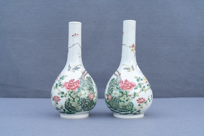 A pair of Chinese famille rose bottle vases, 19th C.