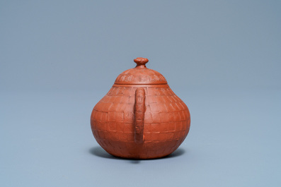 A Chinese Yixing stoneware dragon-spouted teapot and cover, Kangxi