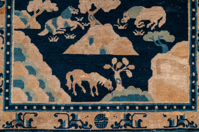 A large Chinese rectangular 'Eight horses of Mu Wang' carpet, 19th C.