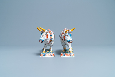 A pair of of polychrome Dutch Delft models of cows, 18th C.