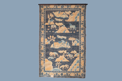 A large Chinese rectangular 'Eight horses of Mu Wang' carpet, 19th C.