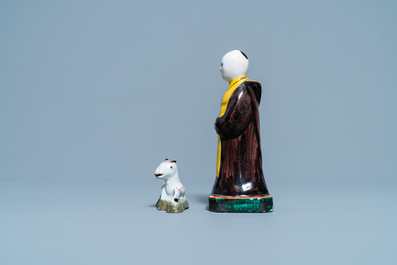 A polychrome Dutch Delft miniature of a horse and a figure of a monk, 18th C.