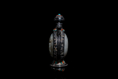 A Chinese jade-, coral- and turquoise-inlaid silver snuff bottle, 19th C.