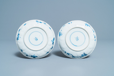 Six Chinese blue and white dishes, a teapot and a helmet-shaped jug, Kangxi and later