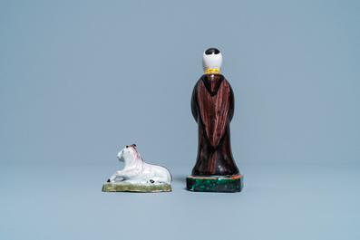 Un mod&egrave;le miniature d'un cheval et une figure d'un moine en fa&iuml;ence de Delft polychrome, 18&egrave;me