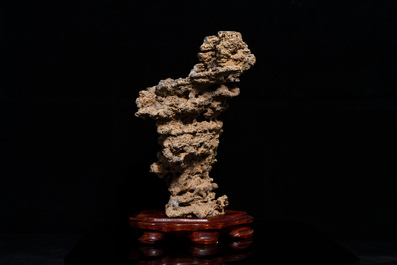 A Chinese scholar's rock on wooden stand, probably Qing