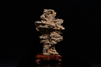 A Chinese scholar's rock on wooden stand, probably Qing